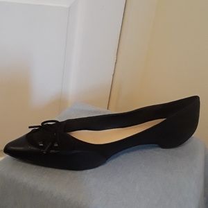 Black and suede pointed toe pumps
